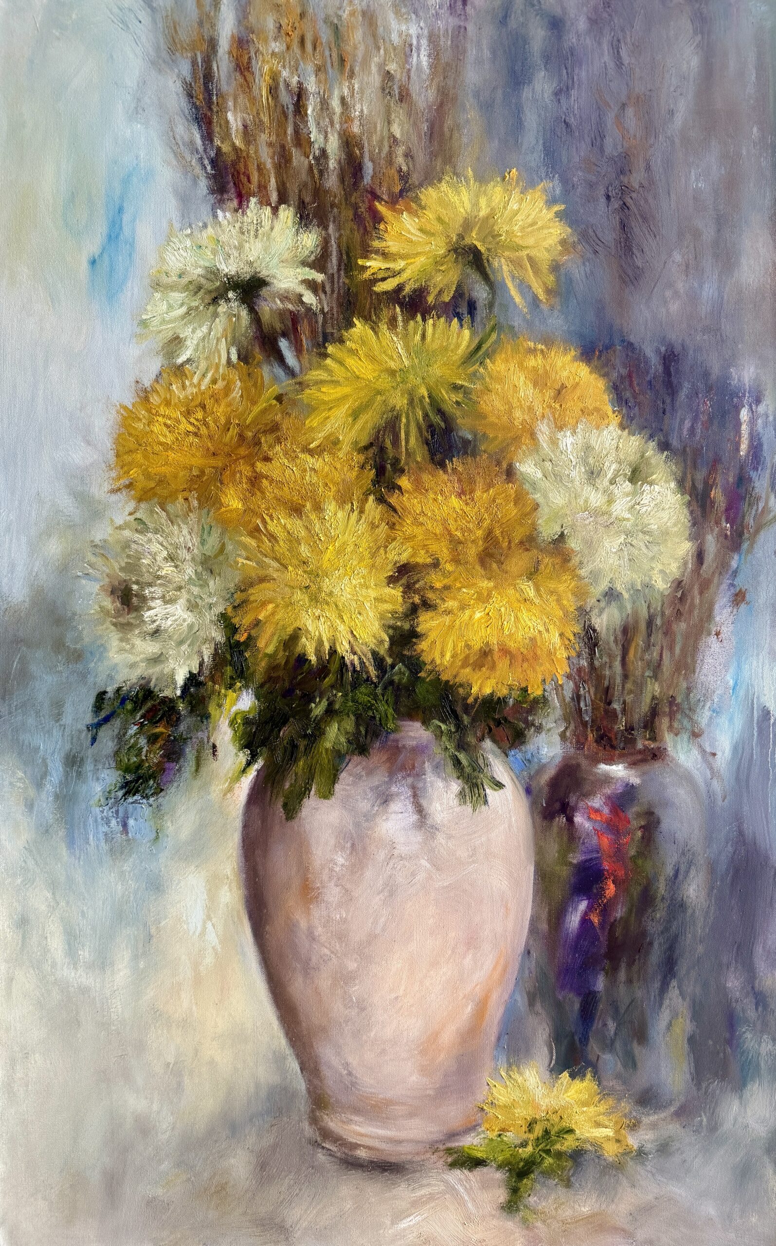 Yellow and white chrysanthemums in a vase